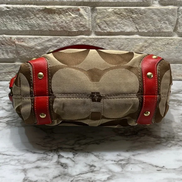 Coach Carly Signature Hobo Bag with red leather trim and gold-tone hardware. - Picture 9 of 14